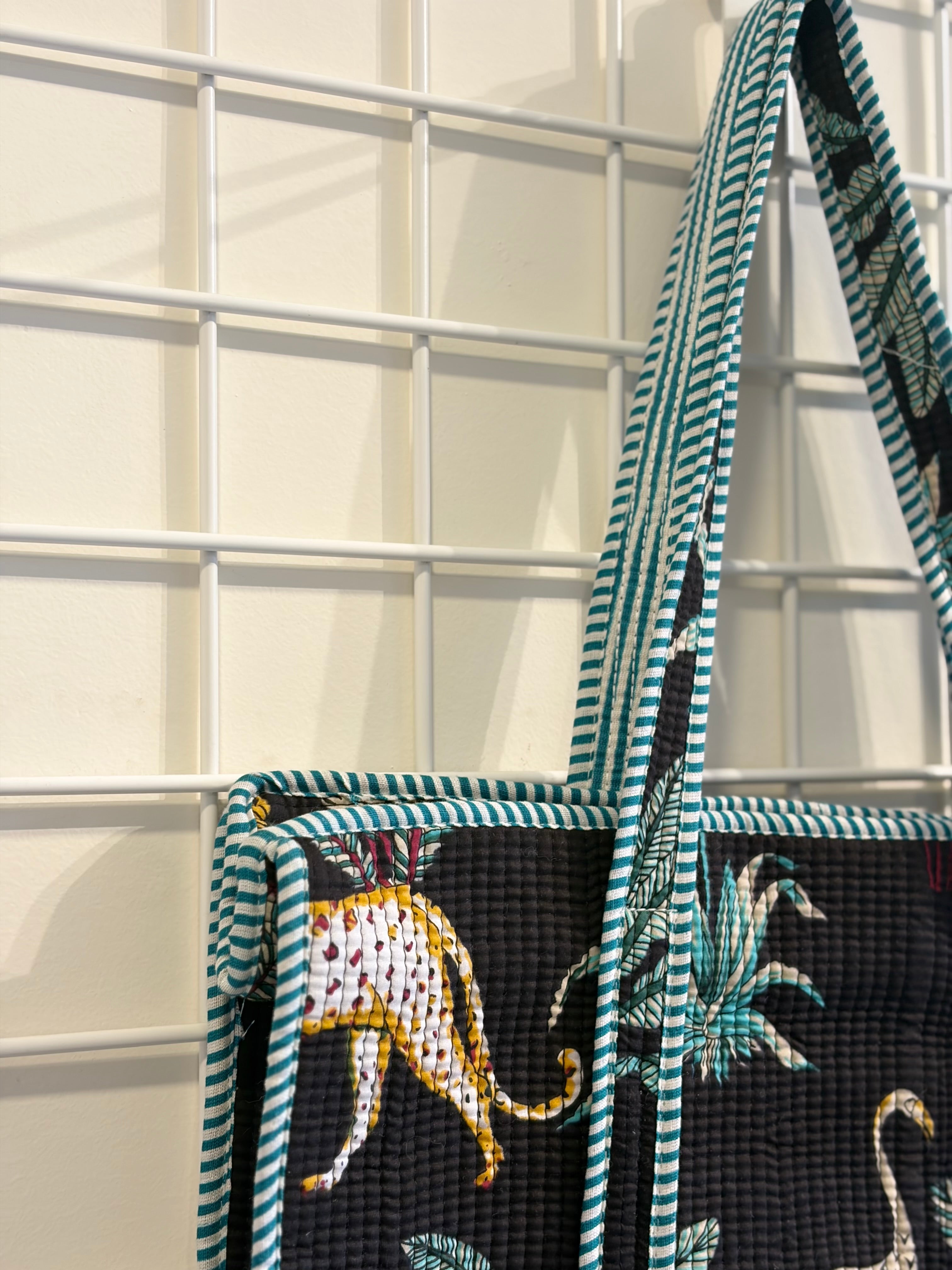 Black animal plant tote bag